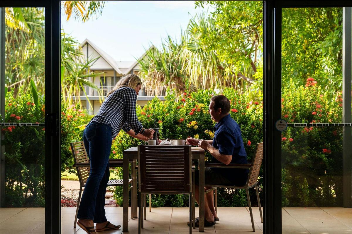 Enjoy afternoon drinks on the apartment verandah