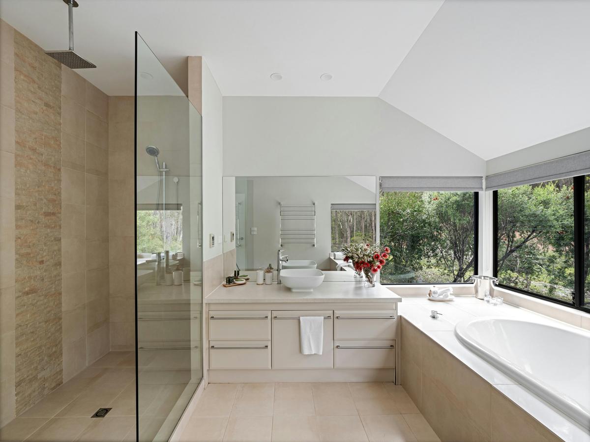 Luxury Romantic Bathroom with 2 person bath tub overlooking the beautiful native forest