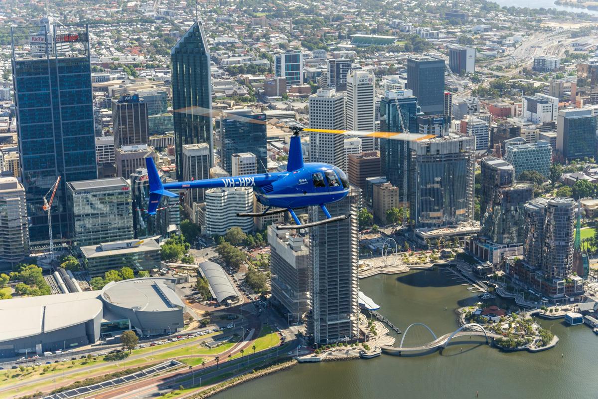 Jandakot Heli-Co helicopter flying over Perth during a City and Beaches scenic flight.