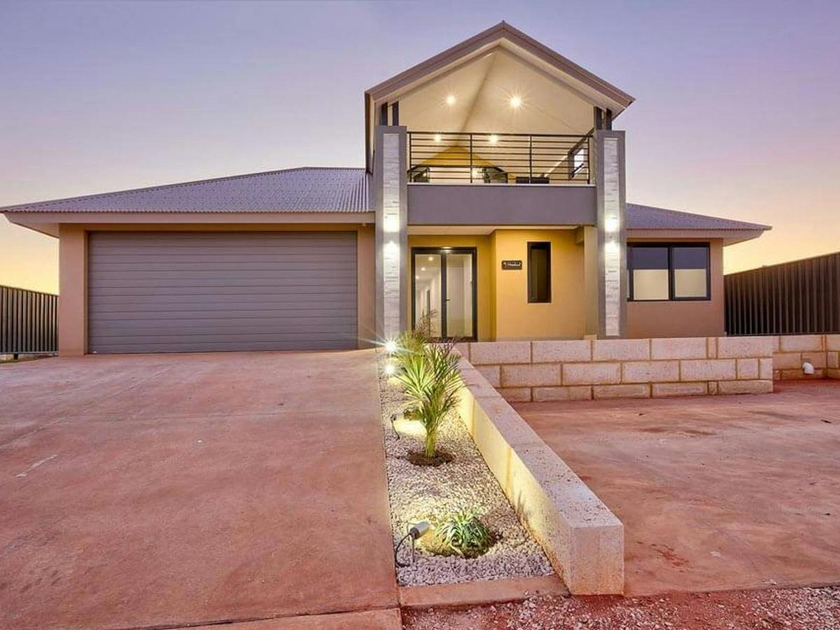 Luxury canal front holiday home with private jetty, swimming pool & stunning sunrise & sunset views