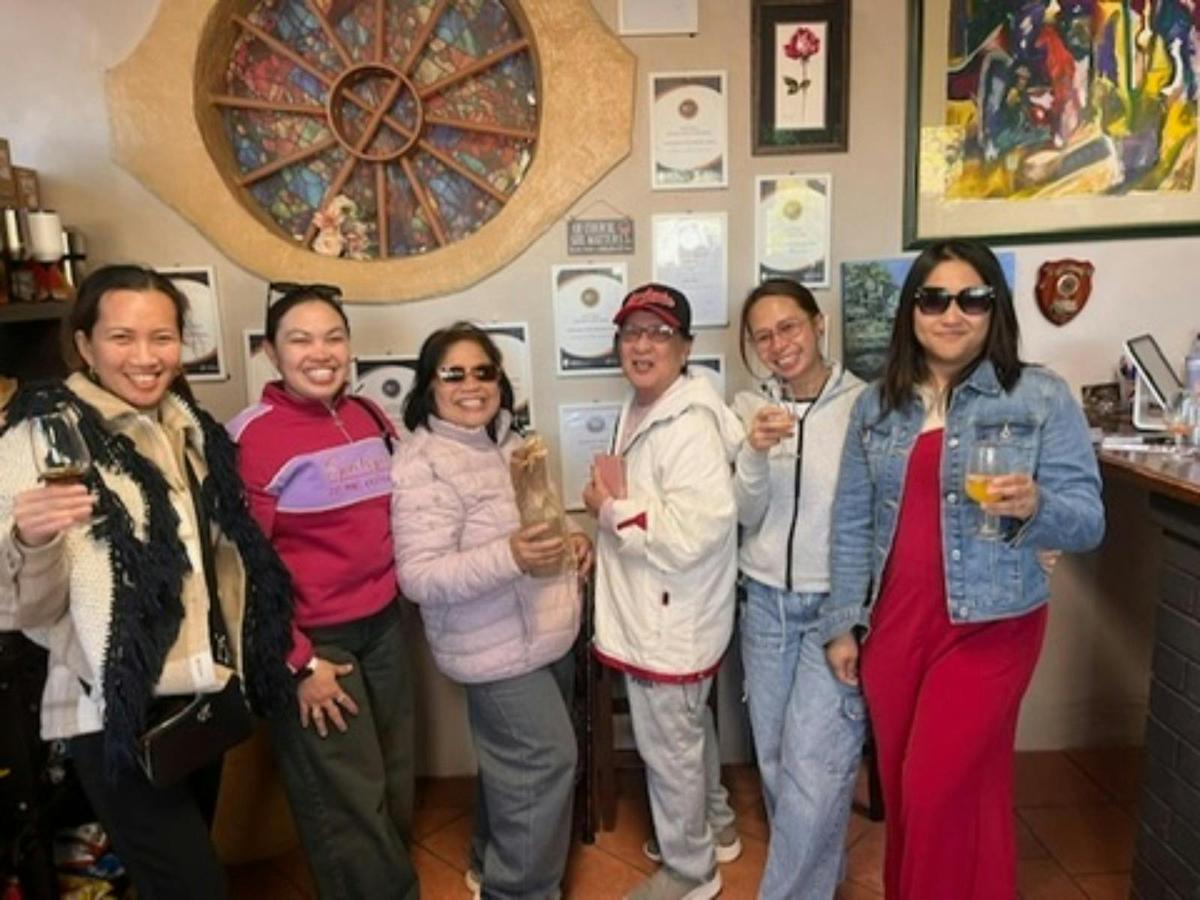 Tourists enjoying wine tasting at Jadran Winery