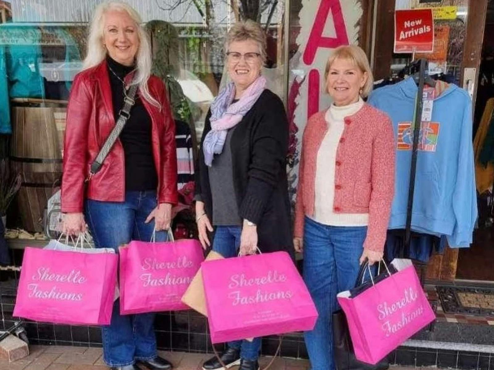 Three happy shoppers after a shopping spree at Sherelle Fashions in Tenterfield