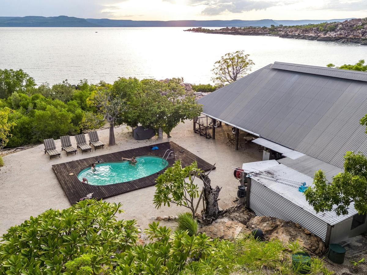 Aerial sunset view of Kimberley Coastal Camp luxury lodge.
