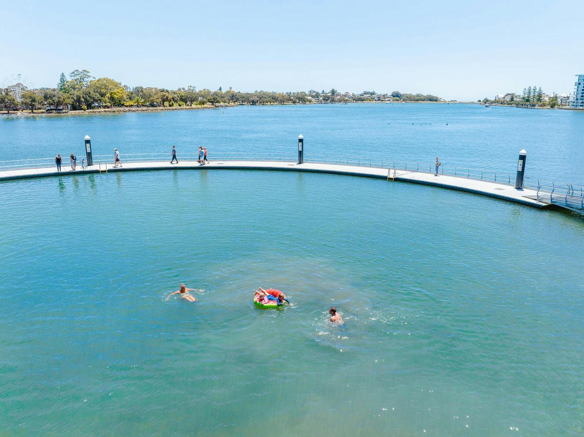Family enjoying a swim at Kwillena Gabi Estuary Pool in Mandurah