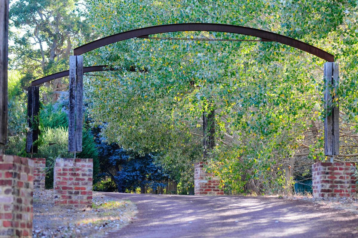 Through the arches to the Lakehouse Spa Villas.