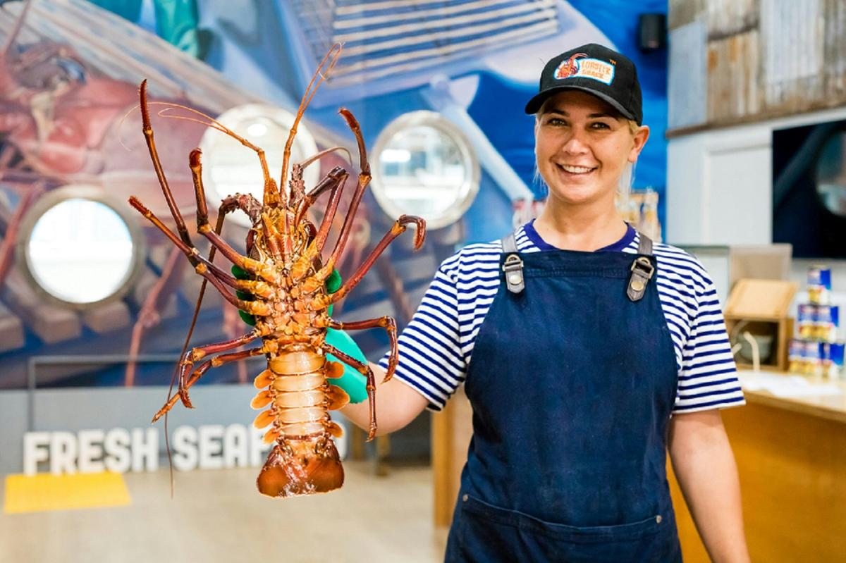 Tour Guide Holding Lobster