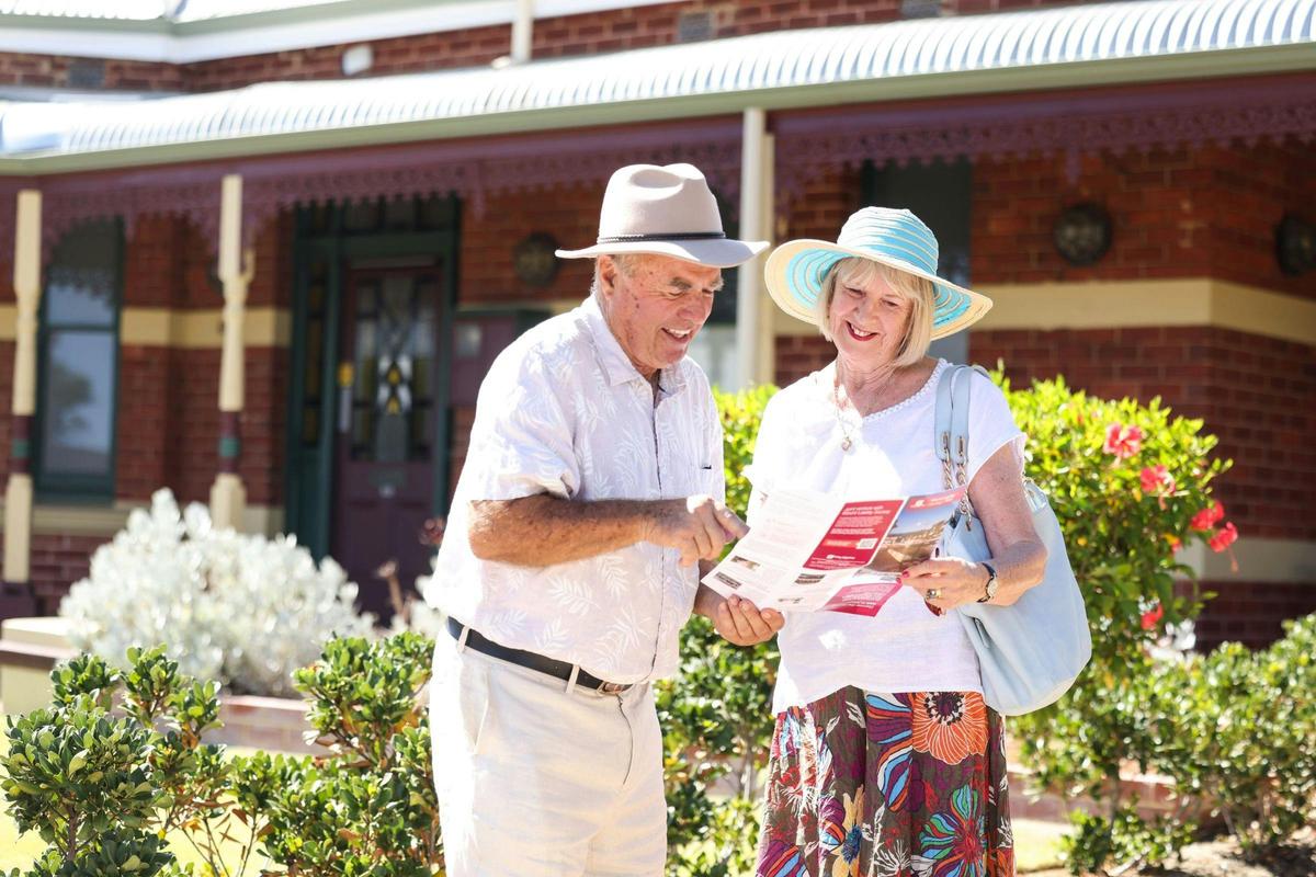 Visitors reading the Mt Lawley Heritage Walk Brochure