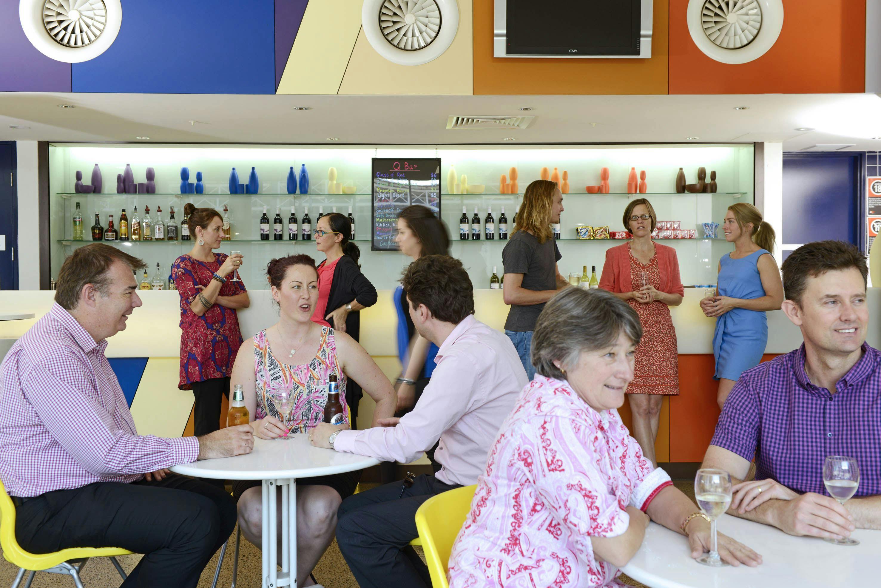 Visitors can enjoy a drink at the bar before or after a show at The Joan