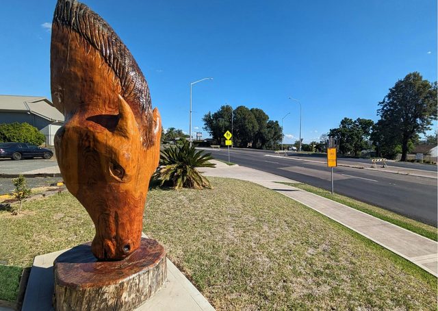 The Grazing Stallion