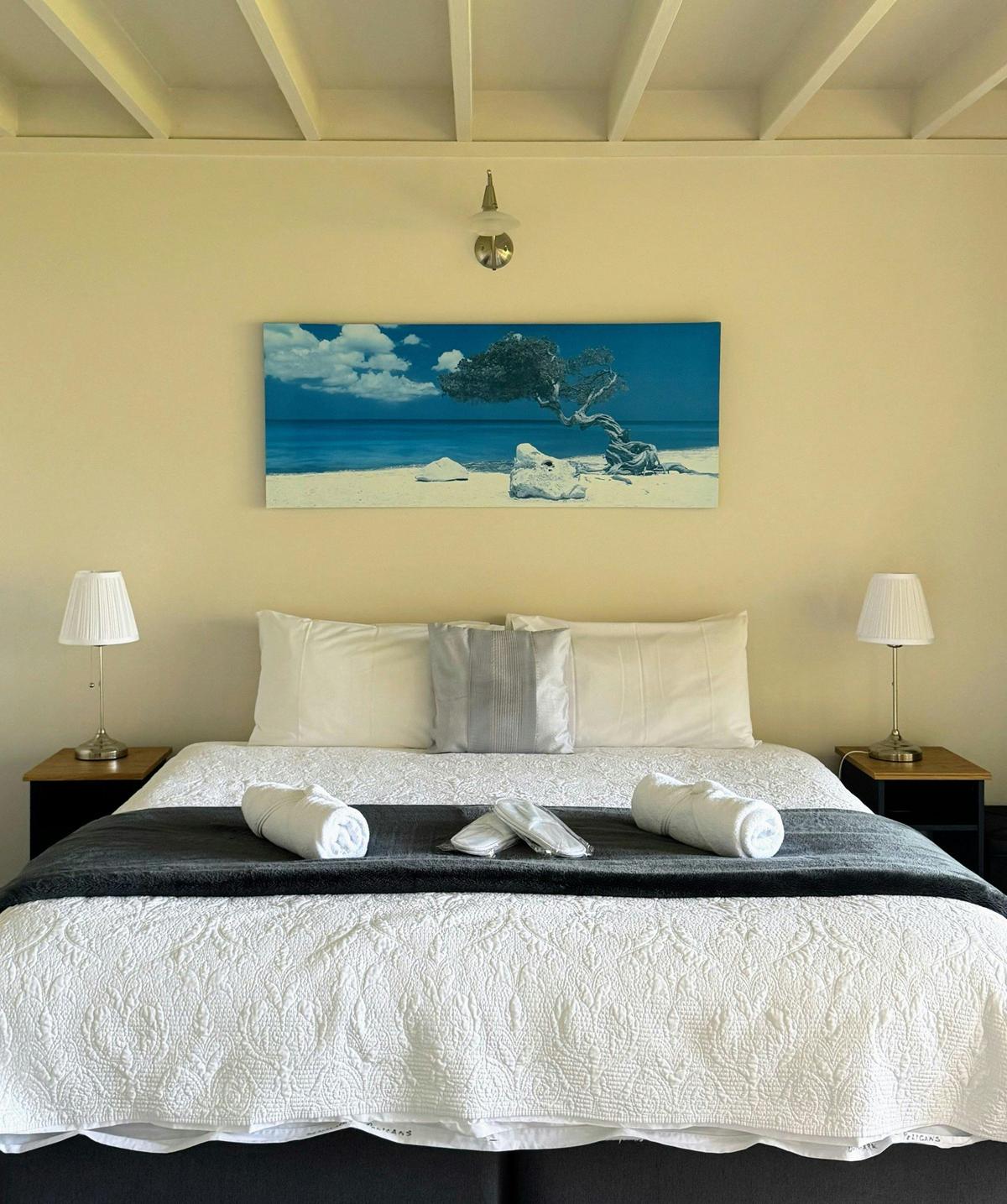 One of two Chalet bedrooms with king bed overlooking the property.