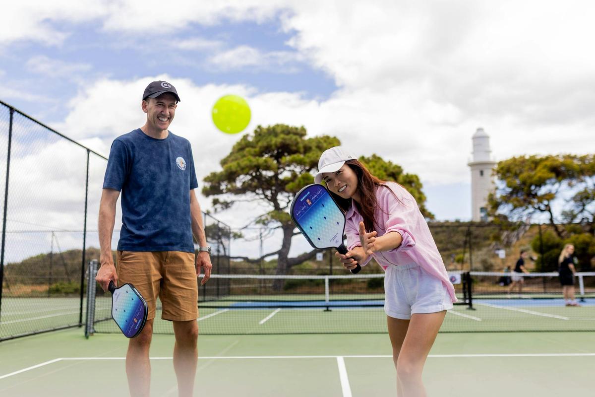 Visitors enjoying pickleball at Rotto Rackets Sports on Wadjemup / Rottnest Island.