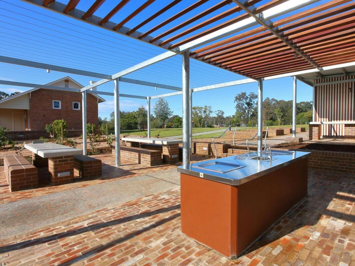 BBQ facilities & seating area at Old Menangle School Park