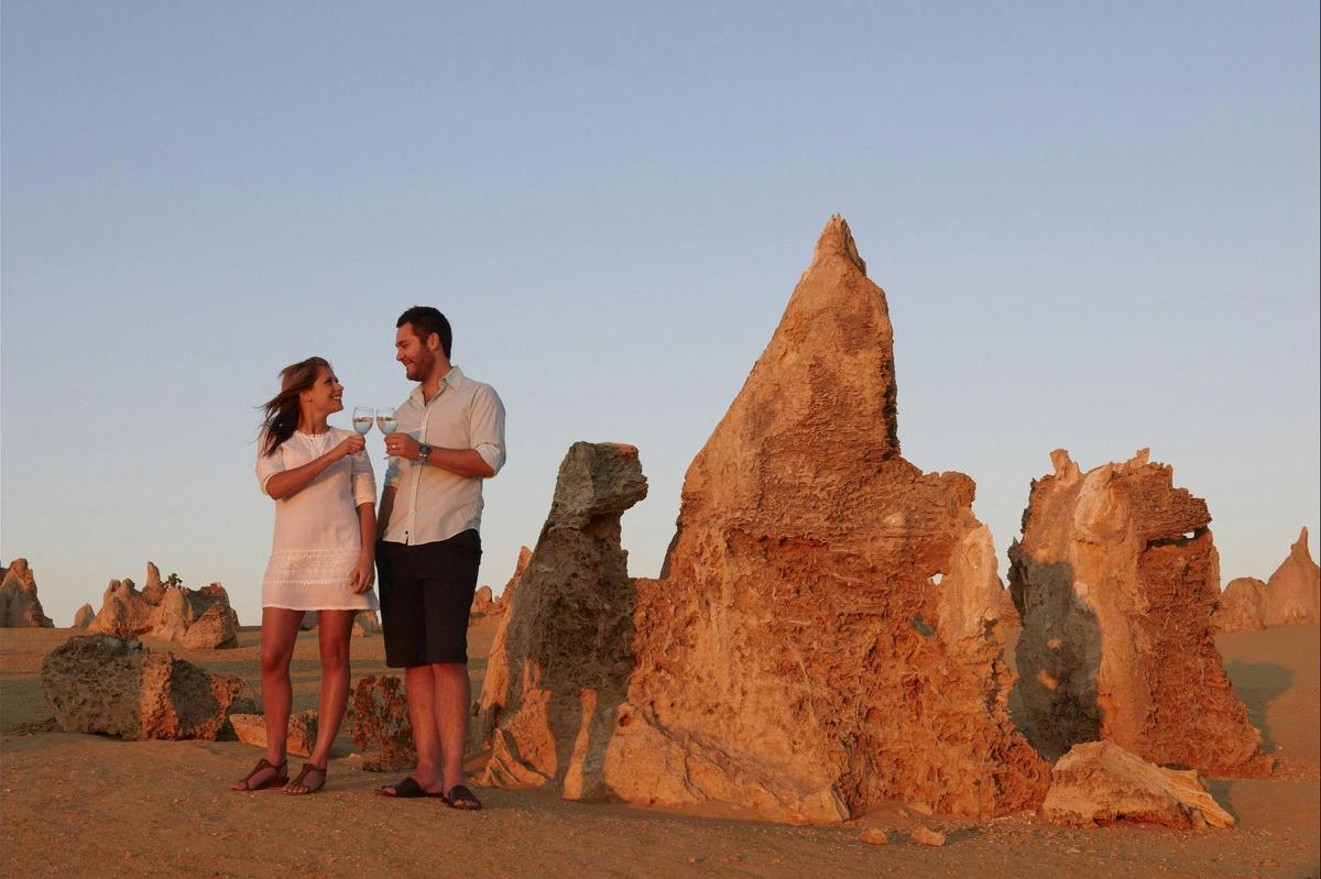 Couple enjoying a wine at The Pinnacles in the Nambung National Park