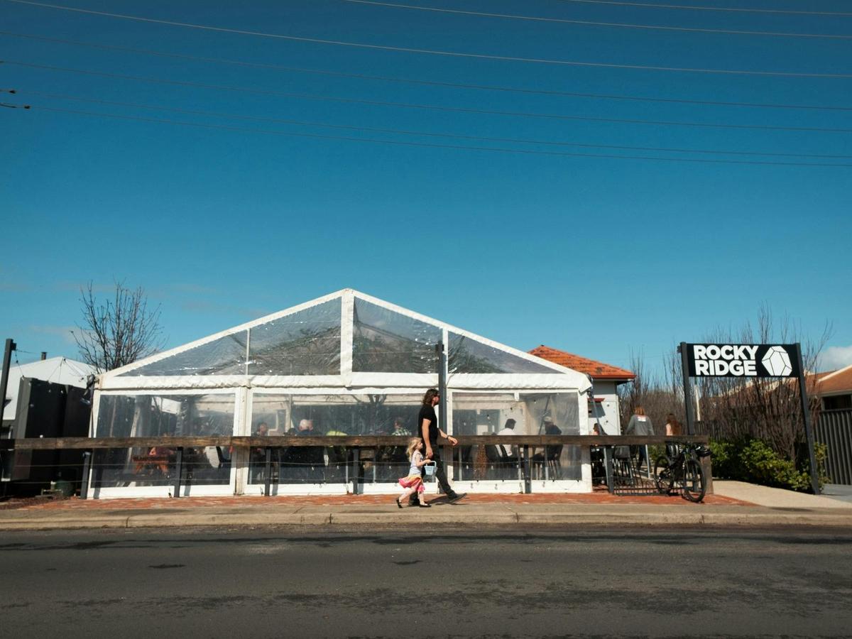Street frontage with a winter gazebo and ramp access for easy entry.