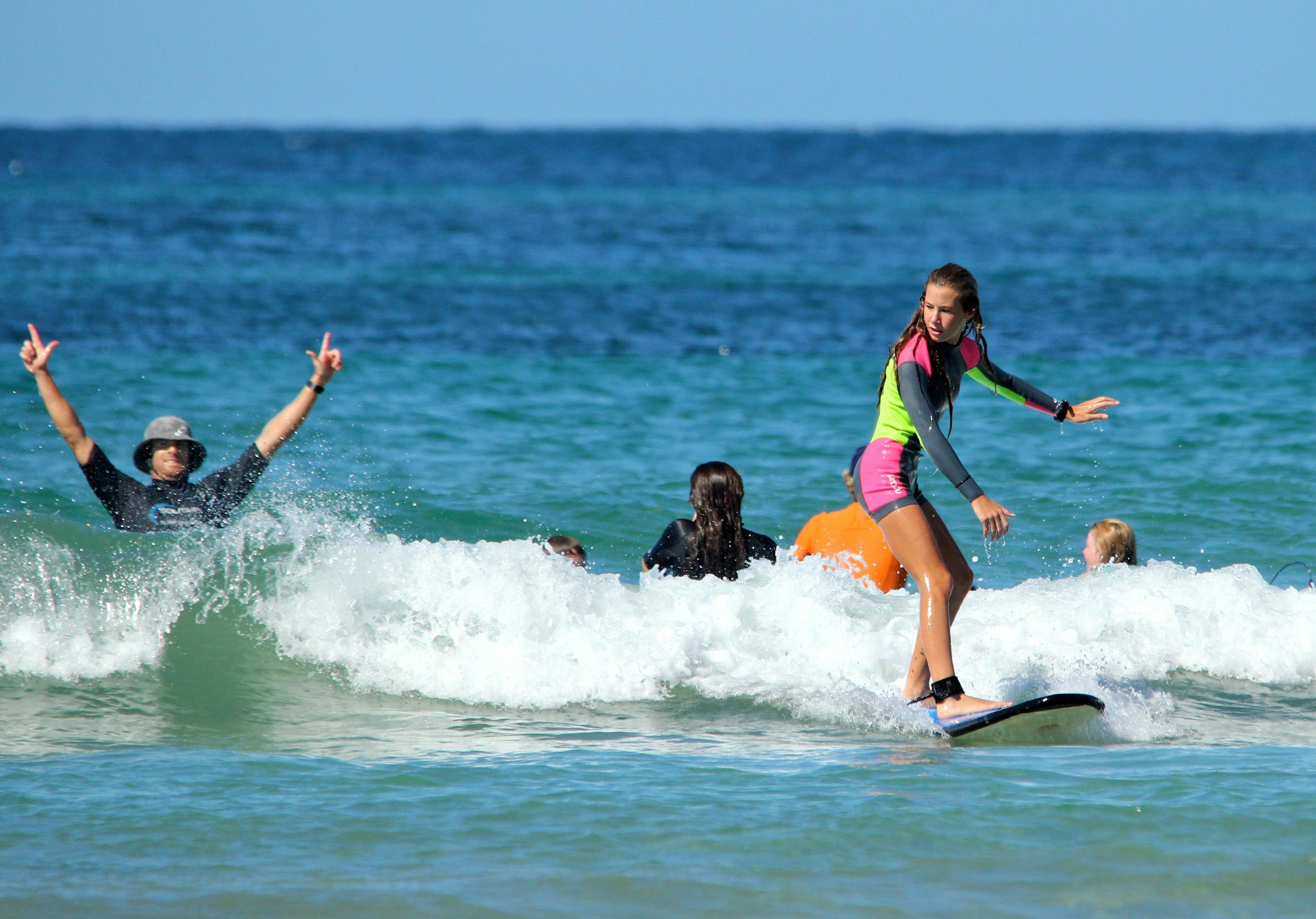 Coaches get as stoked as the participants with riding waves on the Coffs Coast