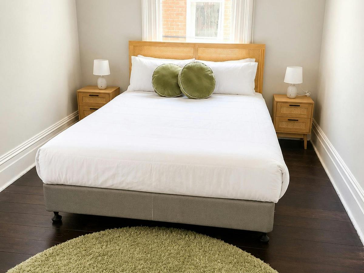 Queen room with shared bathroom