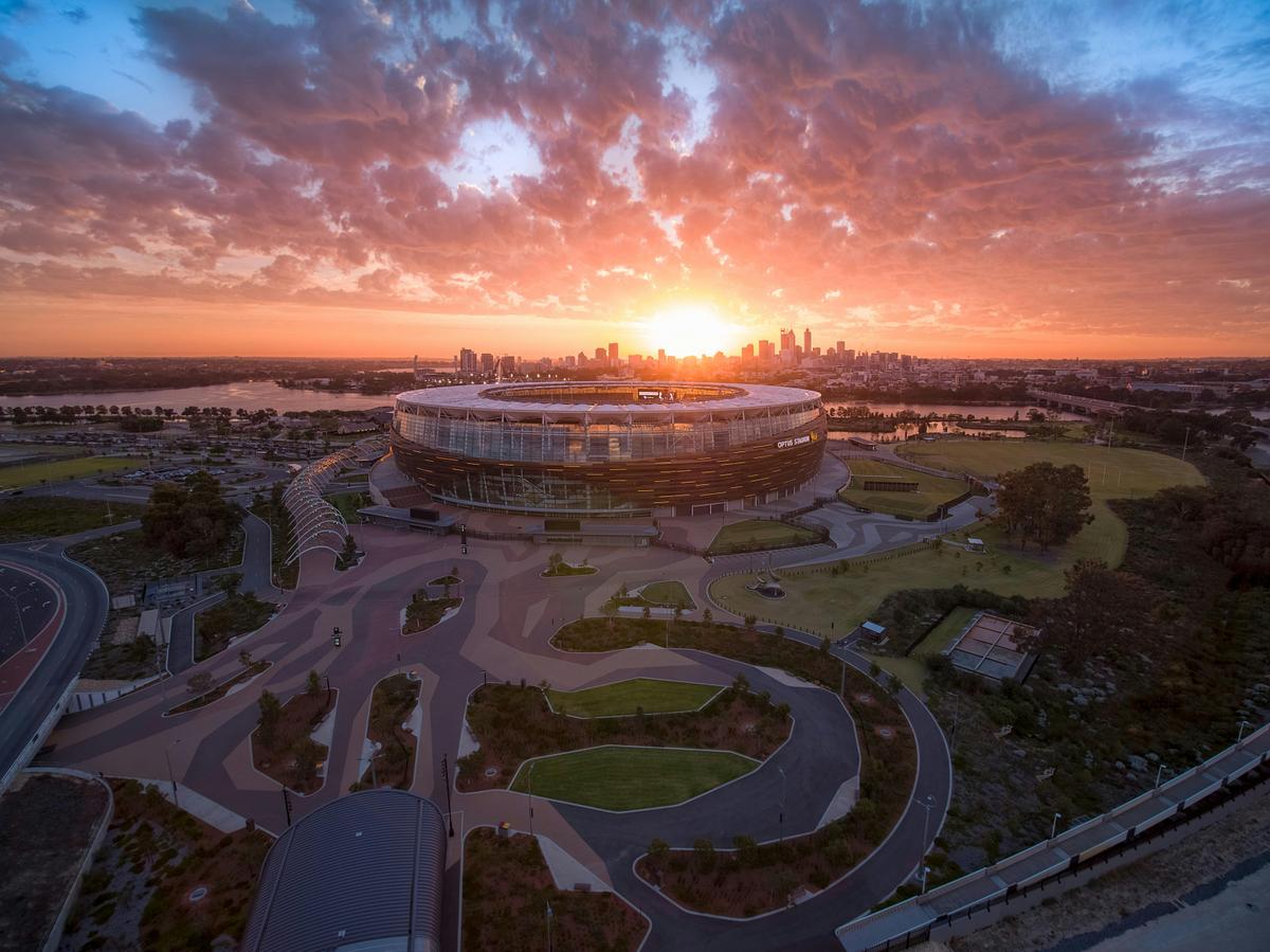 Photo of Optus Stadium and Stadium Park at twilight.