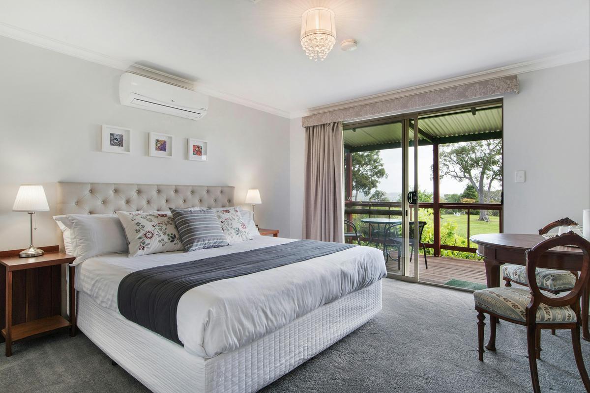 Room two is a King room with ensuites ,air-conditioning and balcony.