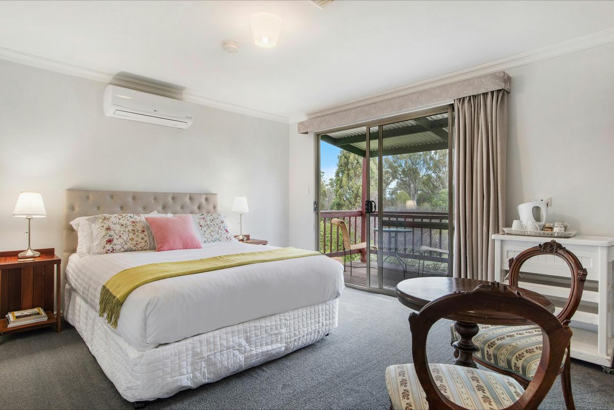 Room three is a Queen room with ensuites and private balcony