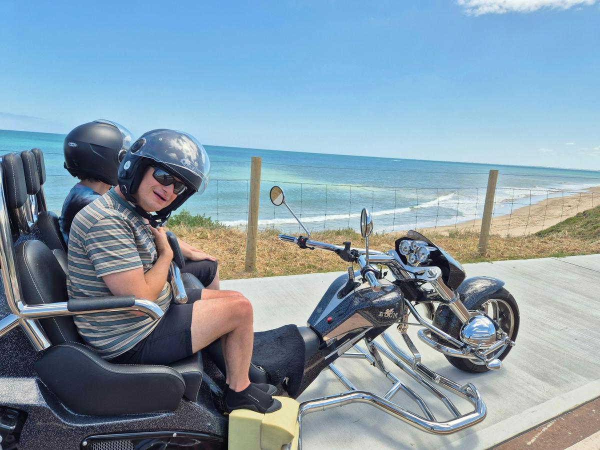Our popular customer with his lovely carer on board cruising around Mandurah's Ocean view tour