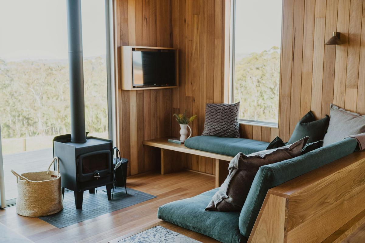 Relax by the fire on the custom oak lounge