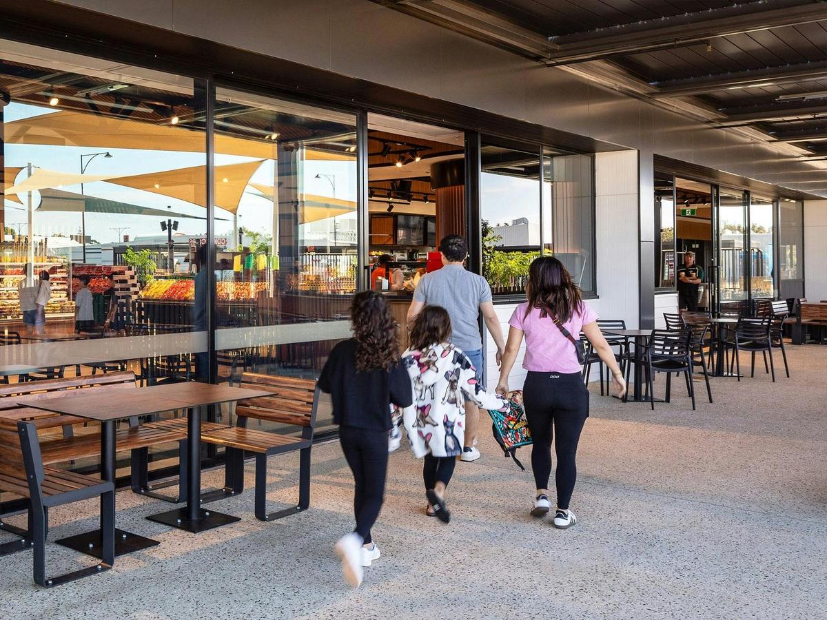 Guests entering the store via our alfresco cafe area