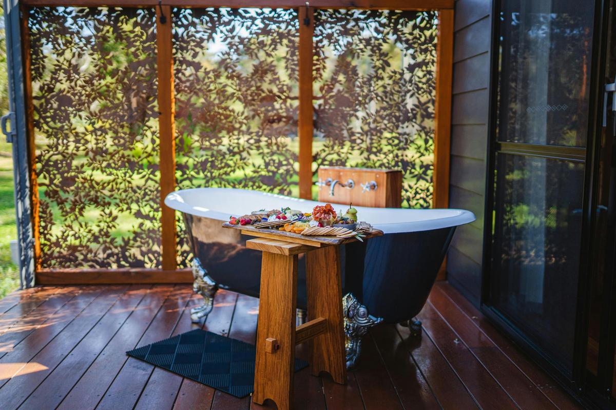 Luxury in nature. Guests love to order a tree chalets grazer and enjoy an outdoor bath