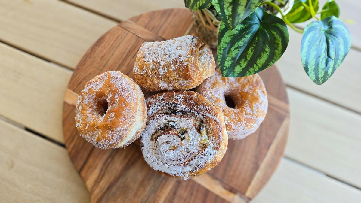 Selection of pastries on wooden board