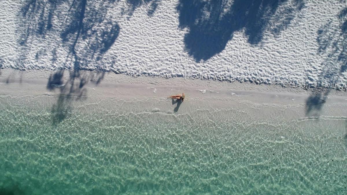 Take a dip in the Beautiful waters of Lake McKenzie