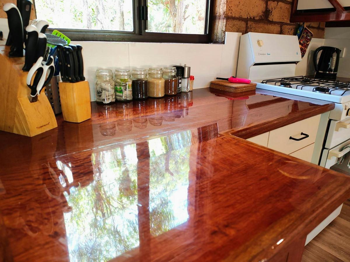 Lodge kitchen with handmade Sheoak & Jarrah tops, plus essentials like tea, coffee & condiments