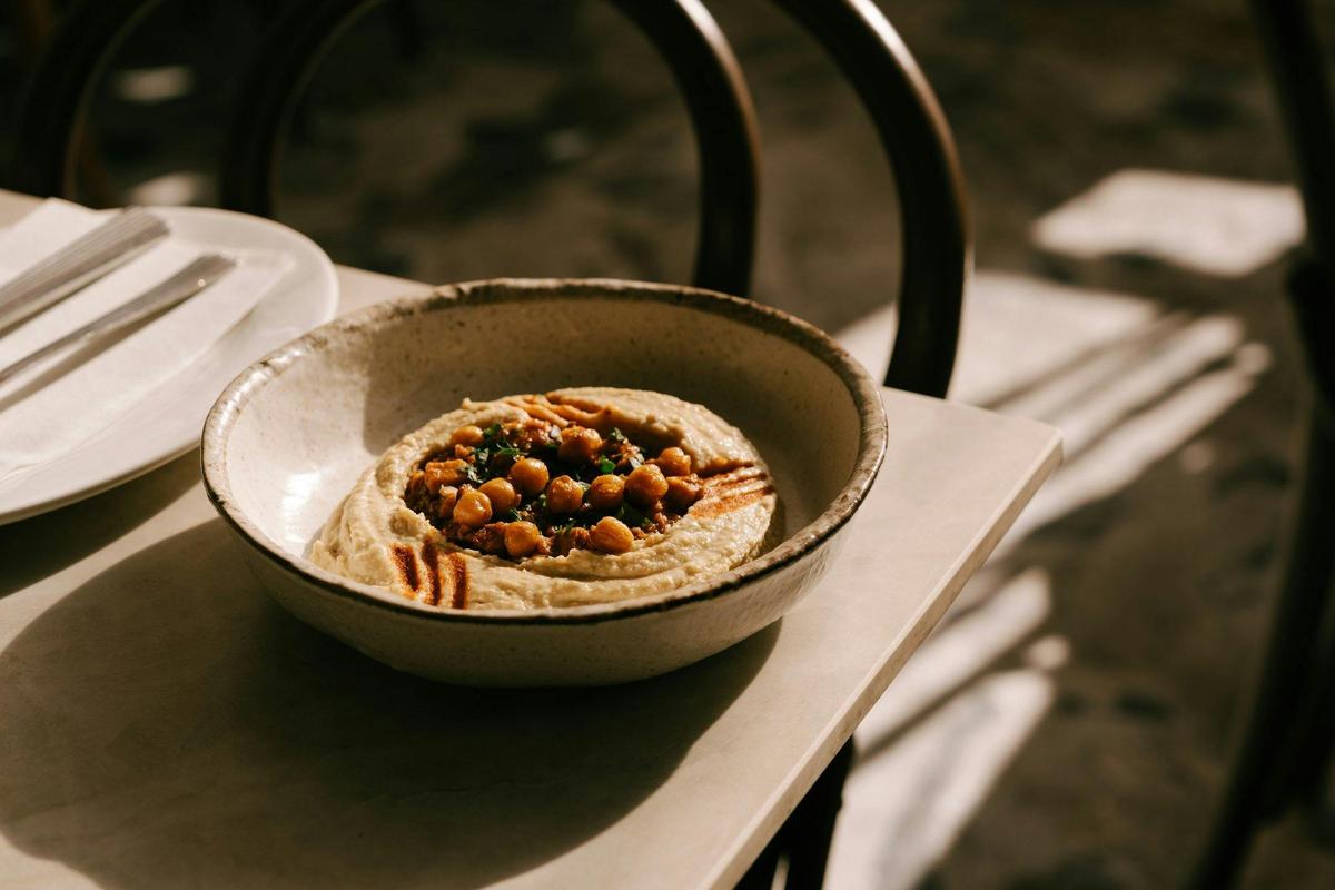HUMMUS | A perfect dish for the table enjoy with our Bread Selection of simitia, crispy bread & pita
