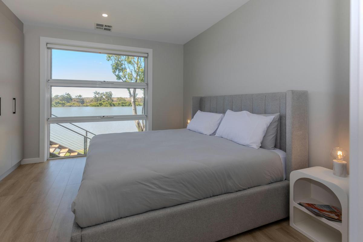 master bedroom with view and ensuite