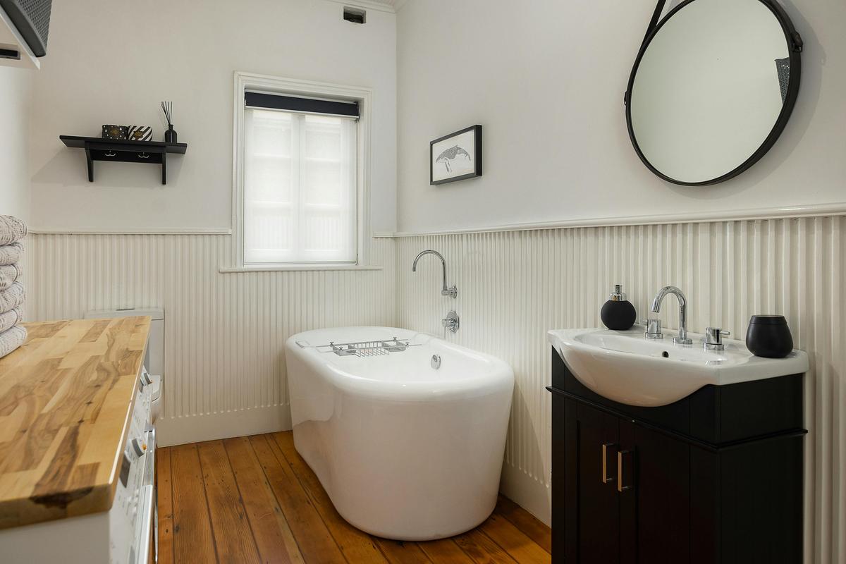 Bathroom - rainhead shower and deep bathtub