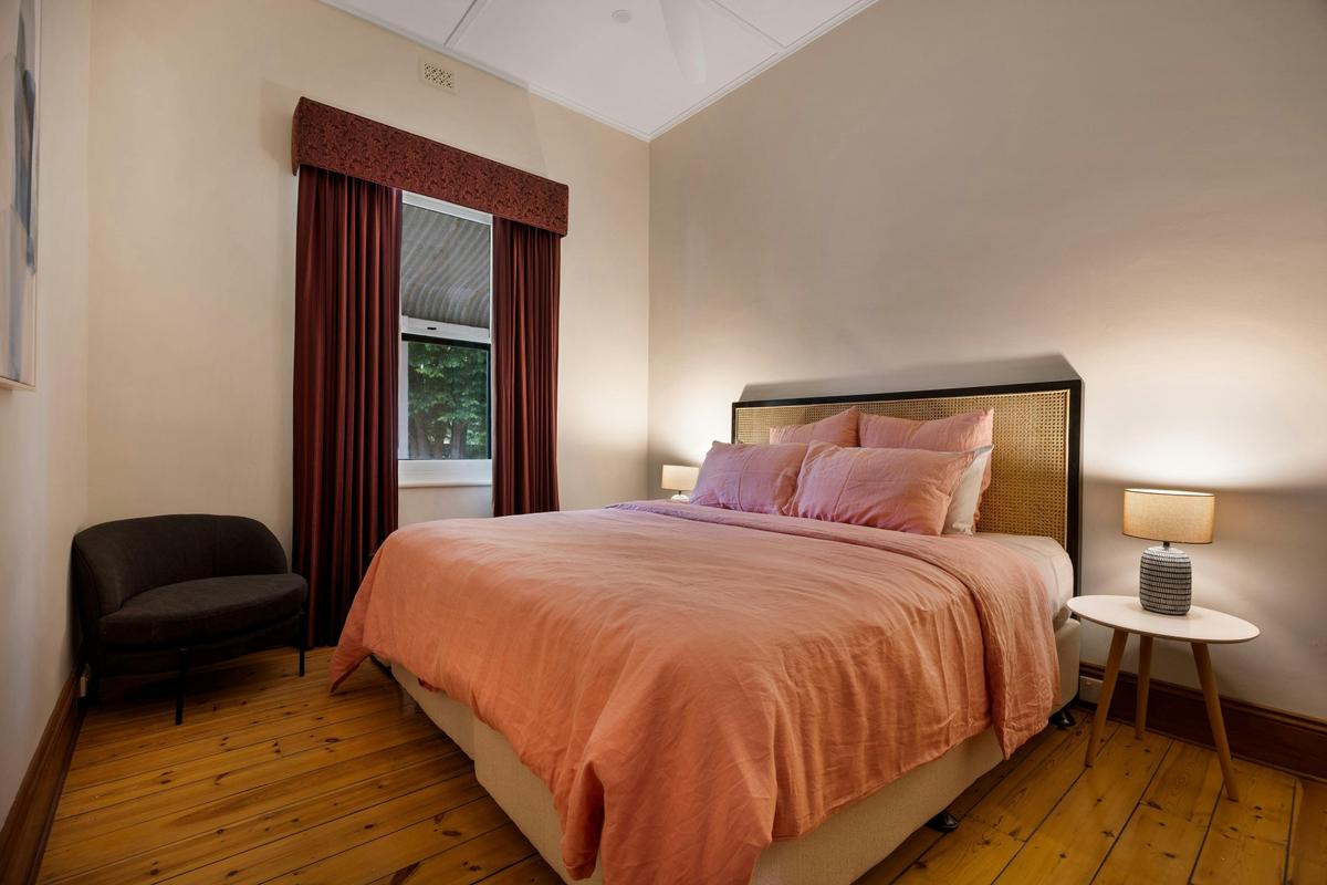 This king-size bedroom features garden views.