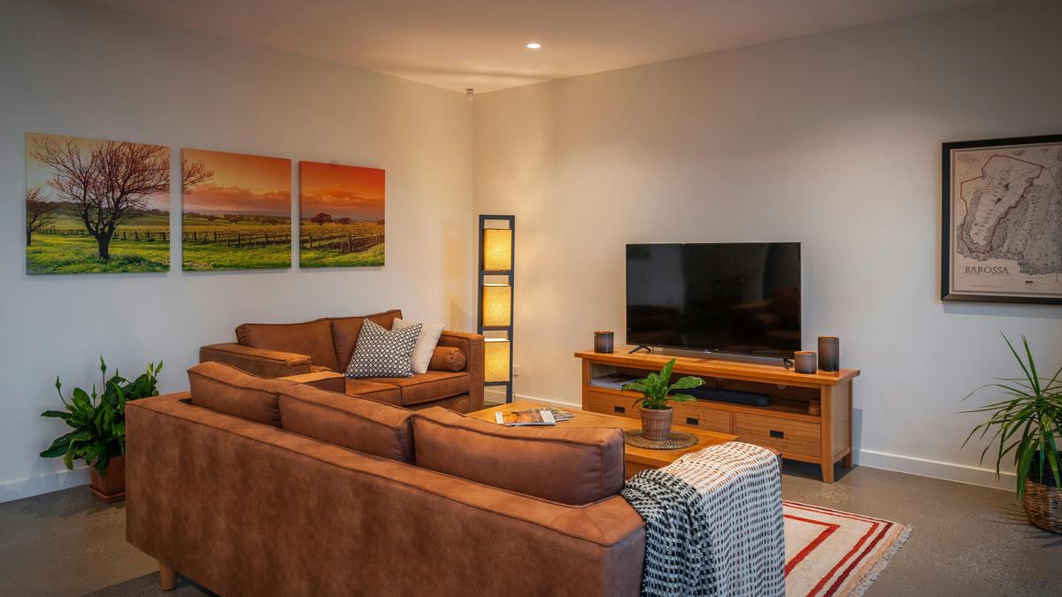 Relax after dinner in the casual living area with smart TV and soundbar