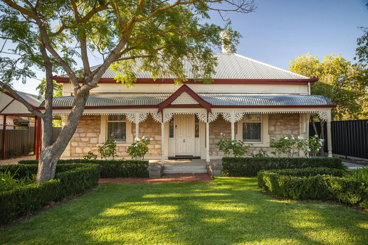 Circa 1900 original stone facade house and front garden