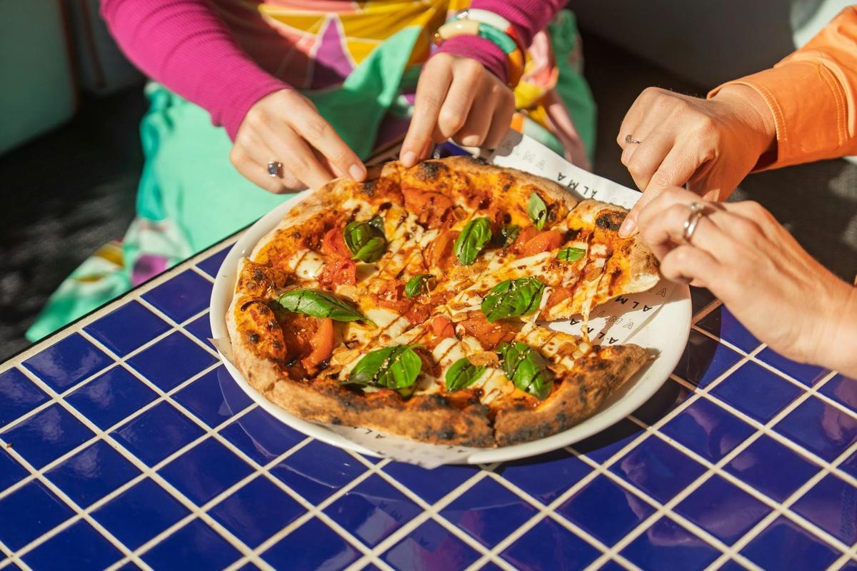 The Alma Tavern serves up delicious, wood-fired pizzas.