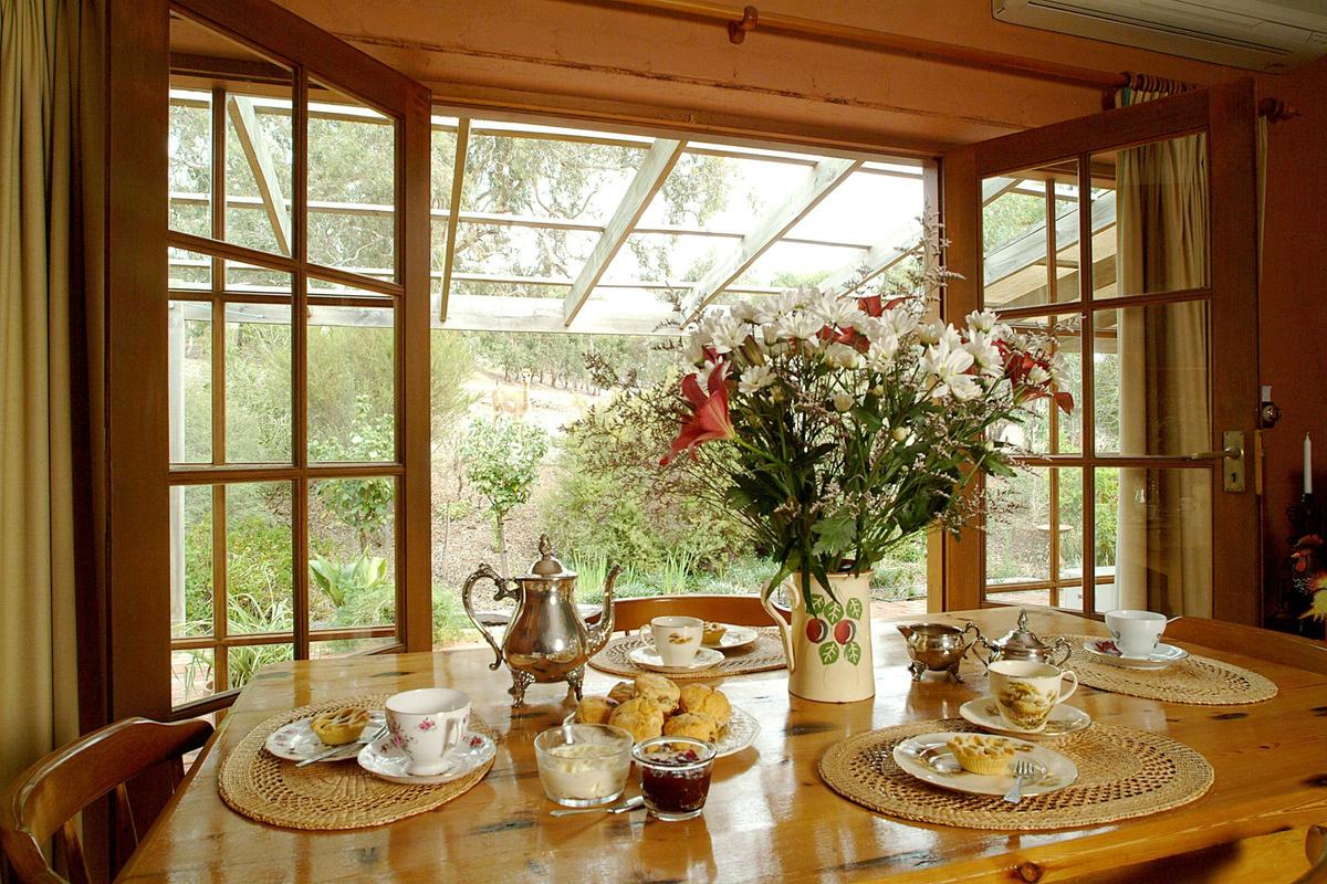 Enjoy the cottage garden while having breakfast and admire the centuries old gum tree.