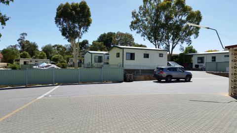 Self-Contained Cabins, Budget Rooms, Powered Sites