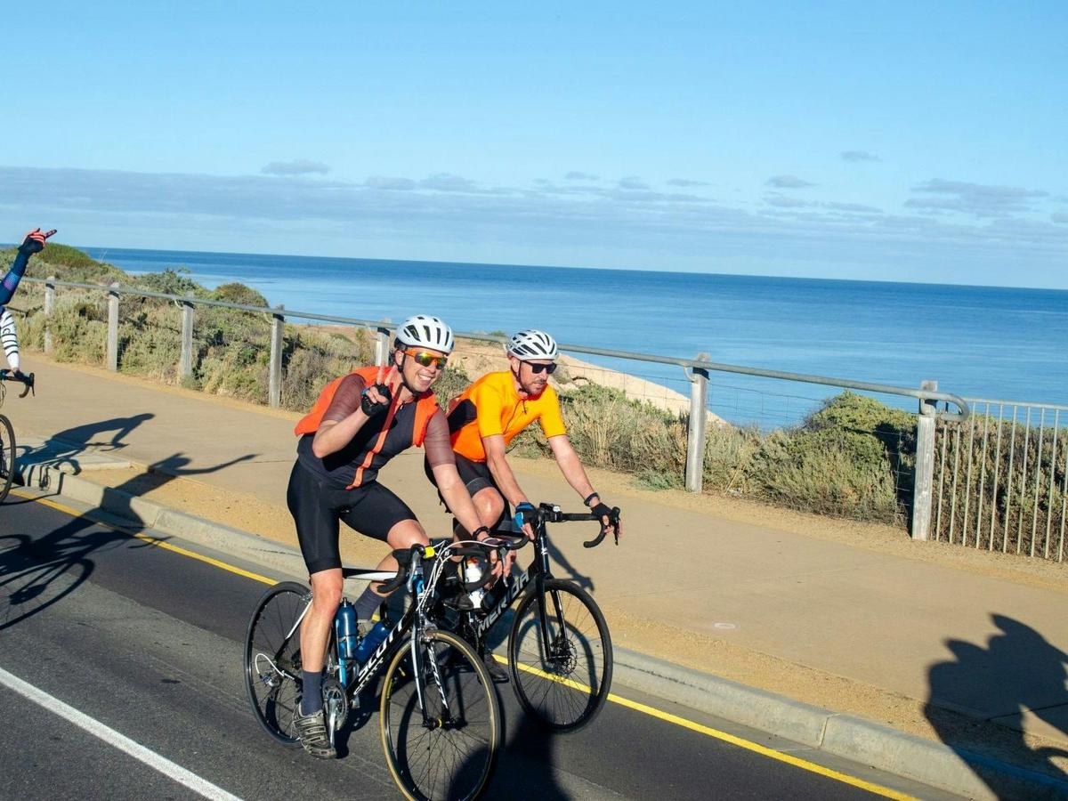 Riders enjoying the sunny ride along the coast.