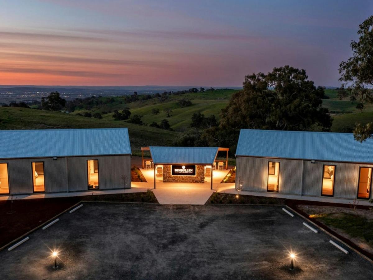 Aerial view of entrance to pavilions with ample parking