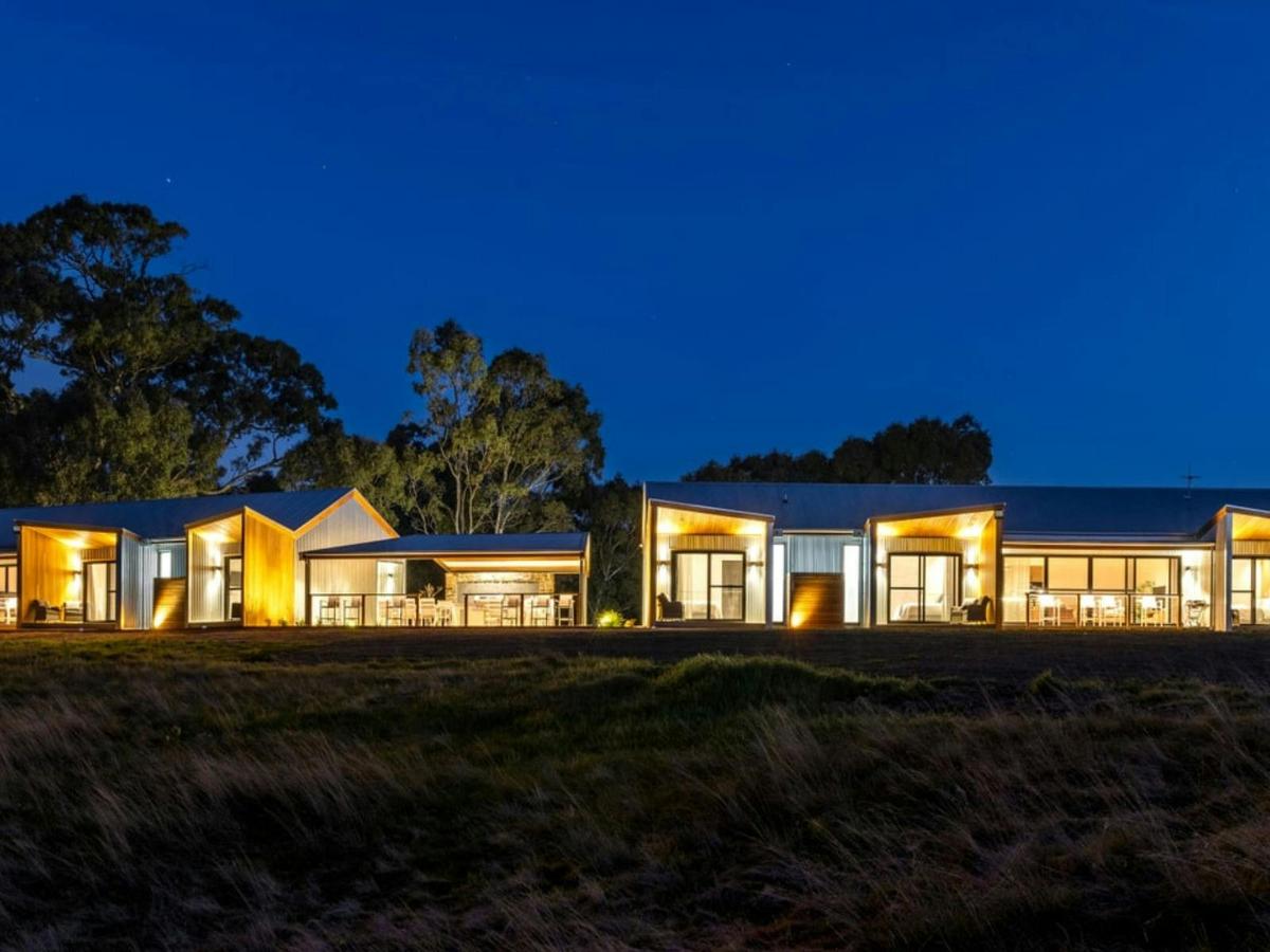 View of two pavilions at dusk