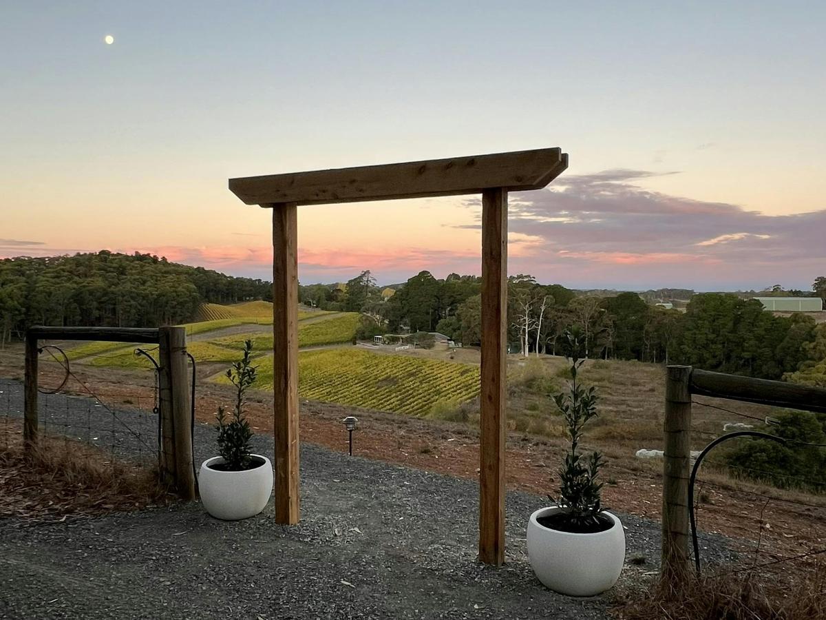 Sunset glow at the arbor - a warm welcome with a view.