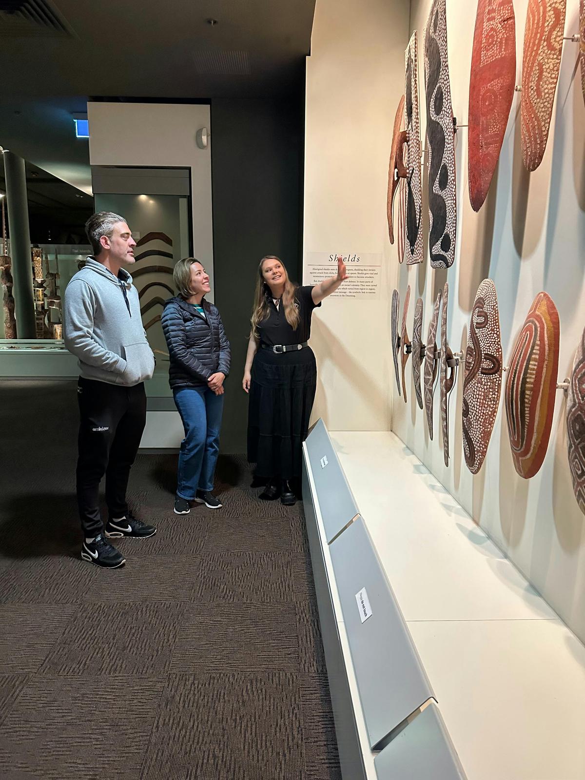 Bookabee guide showing Aboriginal shields at Aboriginal Cultures Gallery Tour