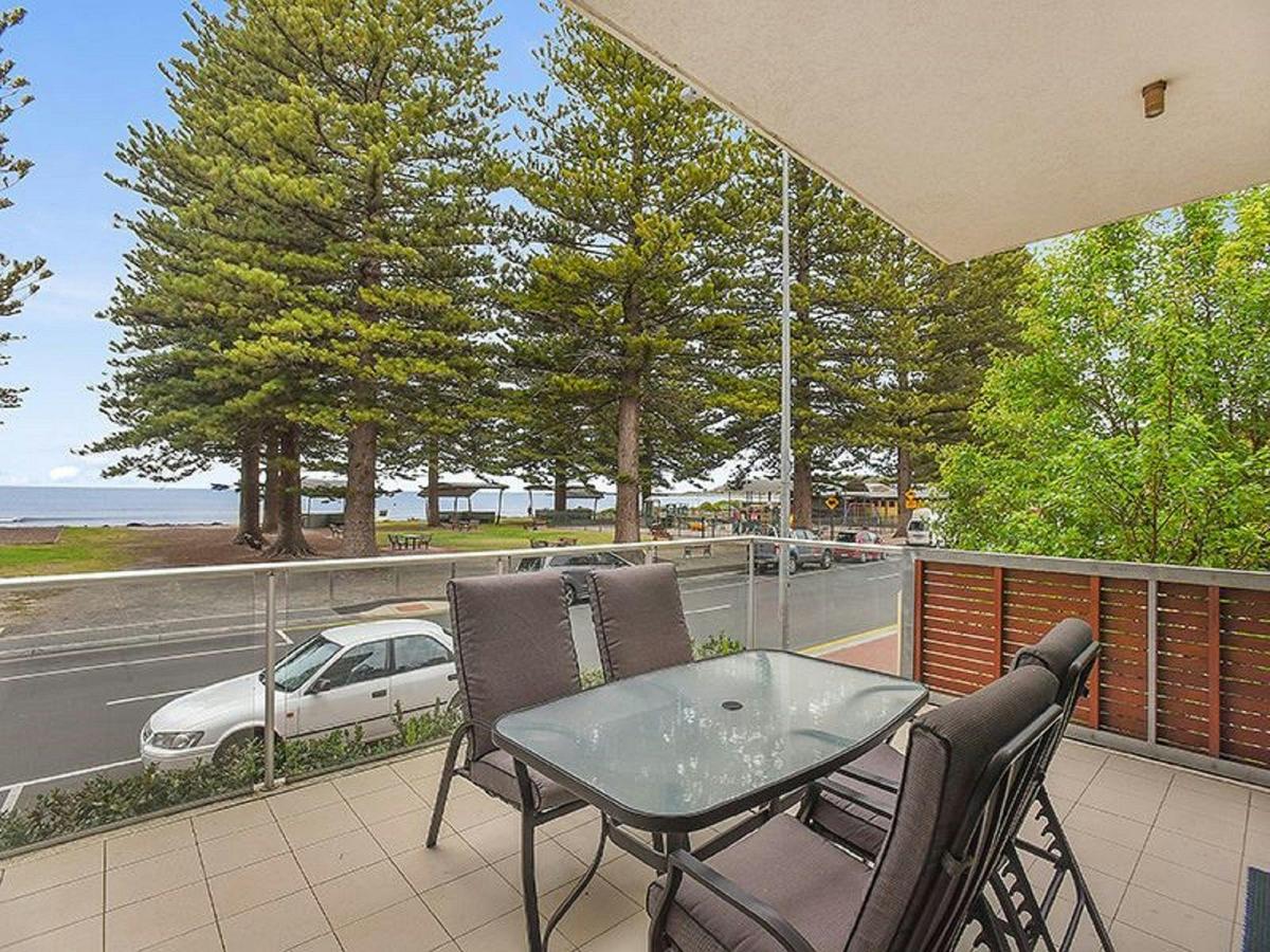 Directly opposite a lawned coastal reserve with panoramic ocean views