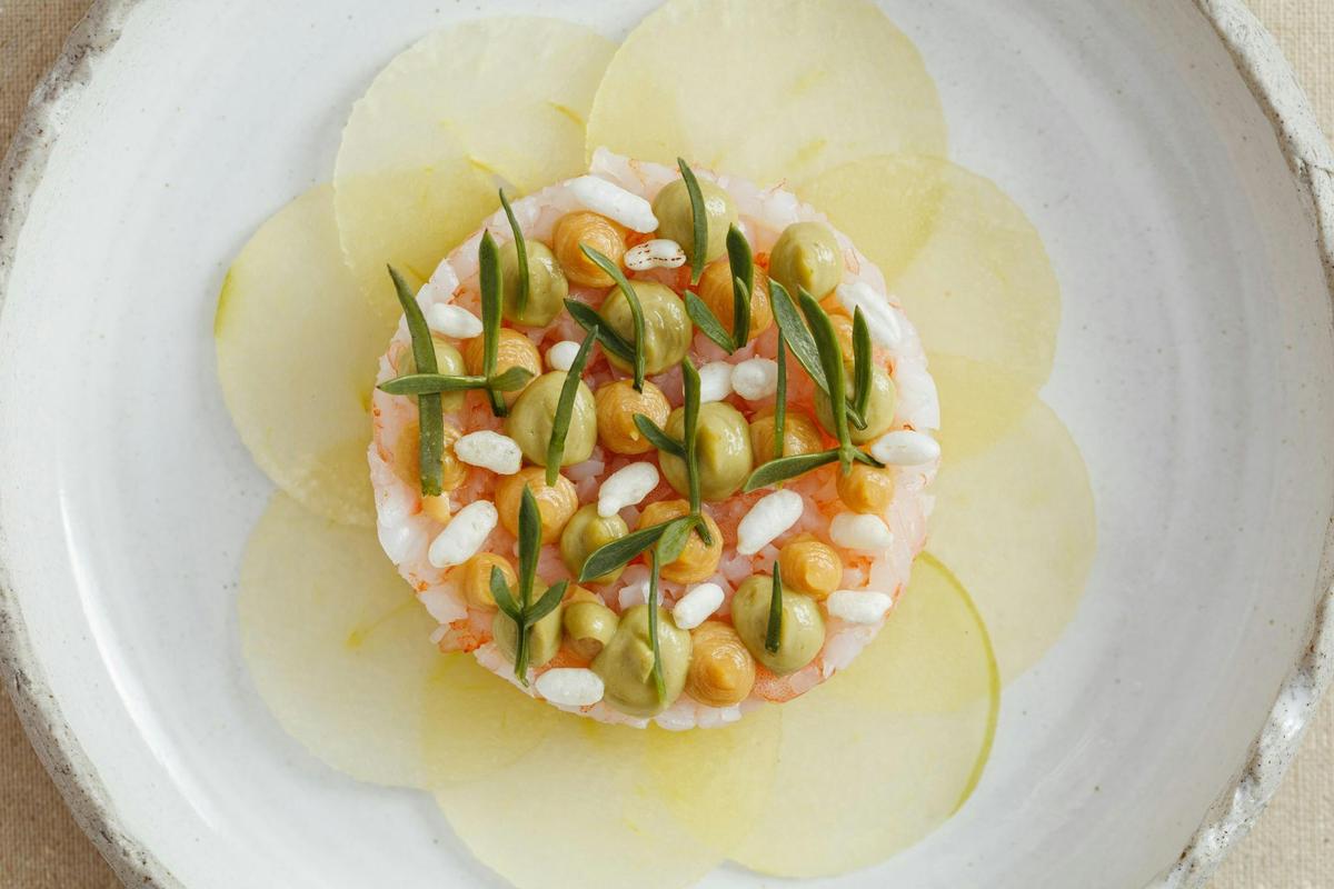 Torched prawn, miso emulsion, lemon myrtle, compressed apple and puffed rice at Botanic Lodge.