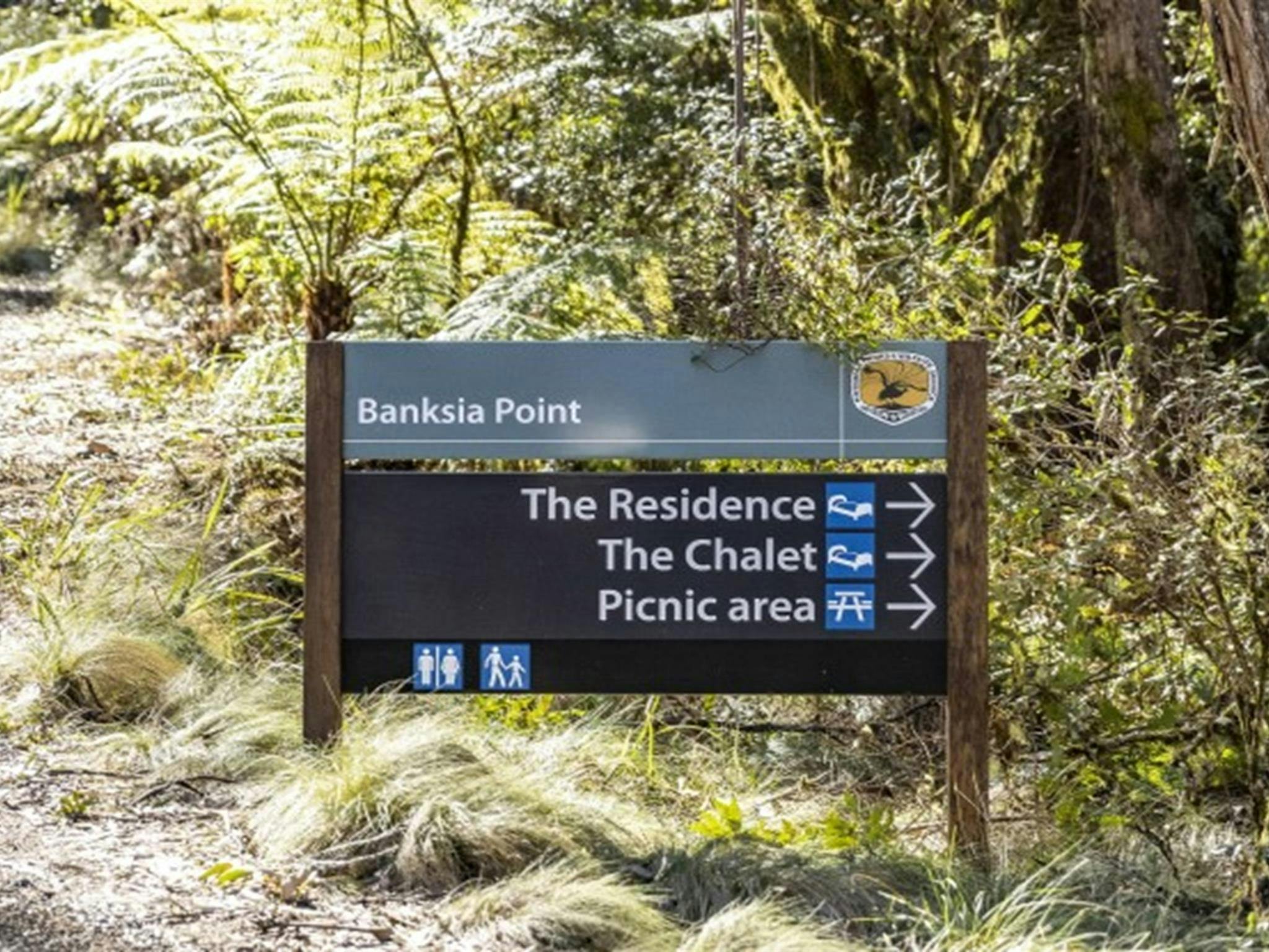 A directional sign at Banksia Point, New England National Park. Photo: Mitchell Franzi &copy; DPIE