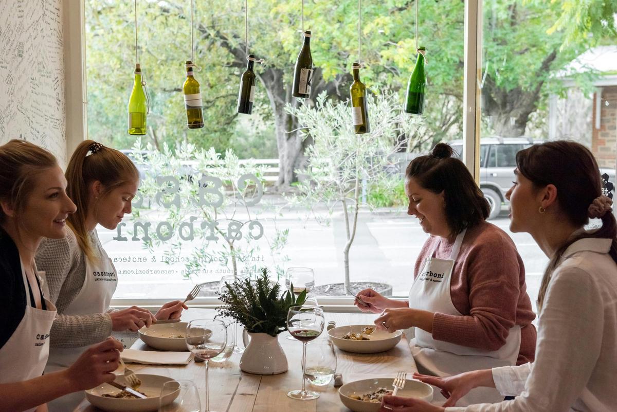 Casa Carboni cooking school guests enjoying their long lunch