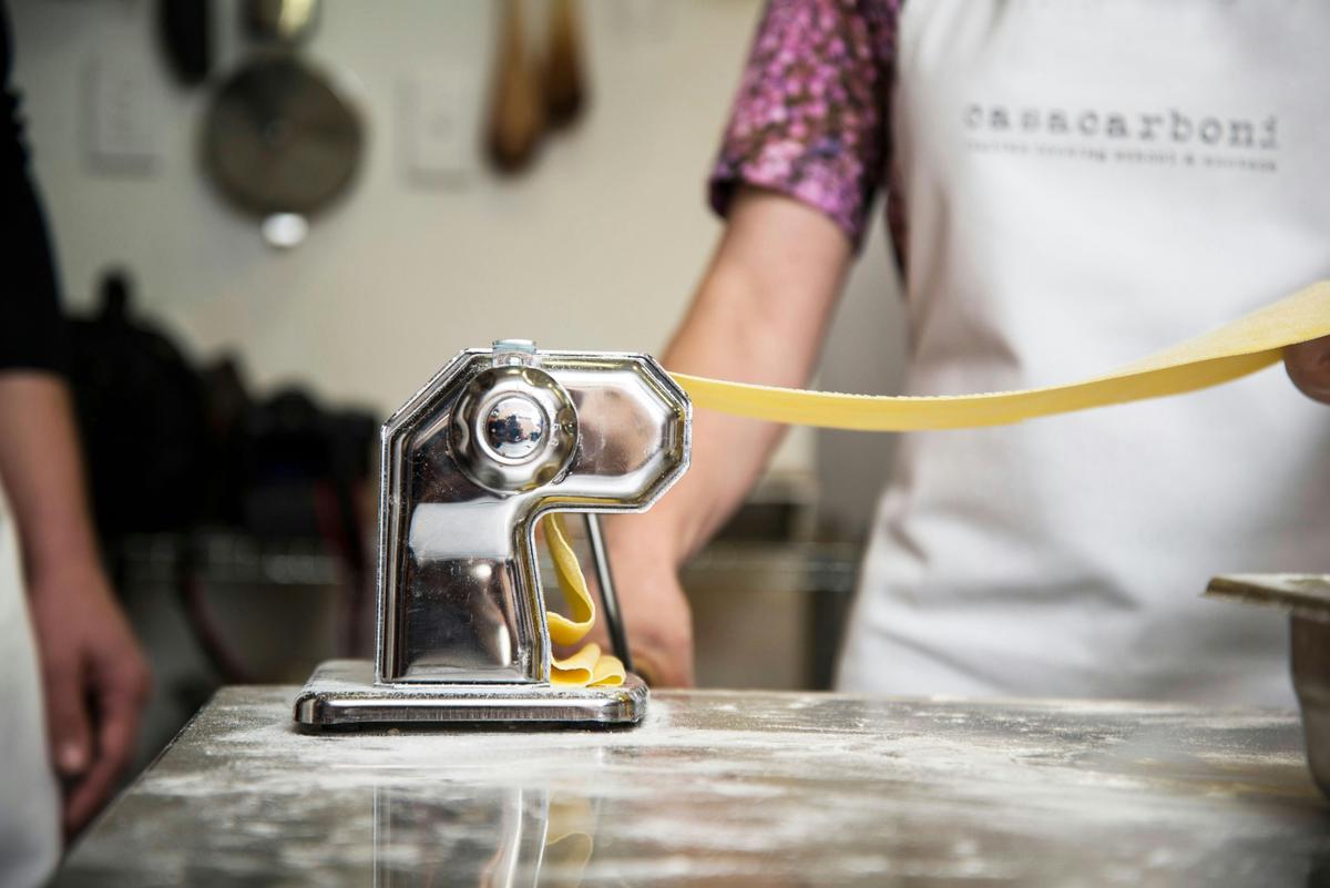 Rolling fresh pasta sheets