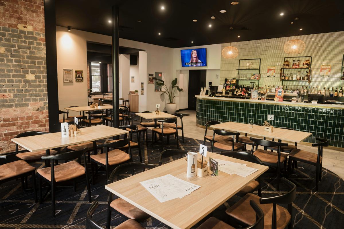 Contemporary design meets cozy dining at the Cross Keys, perfect for casual meals or big celebration